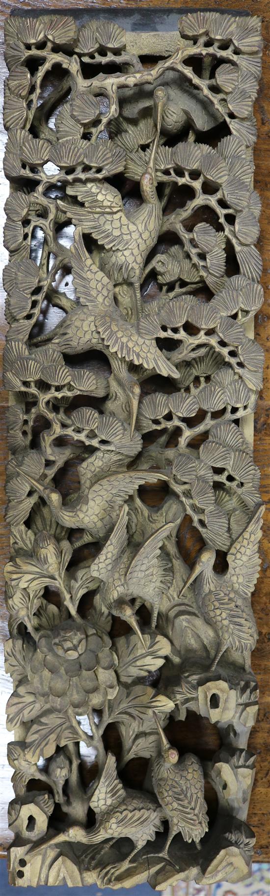 Six Chinese carved giltwood upright panels, soldiers and birds amid foliage